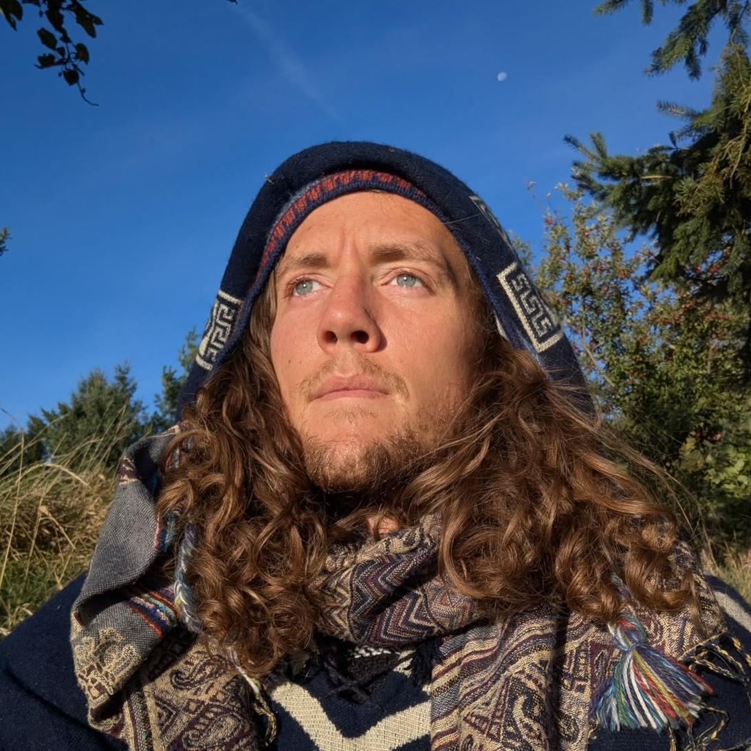 Nathan looking upward toward open sky